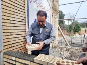 آیین خشت گذاری اولین مدرسه در قالب طرح نهضت توسعه عدالت فضاهای آموزشی در روستای زیفل شهرستان بدره با حضور دکتر کرمی استاندار ایلام